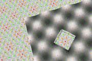 Die winzigen Wirbel aus nur je etwa 15 Atomen bilden ein regelmässiges nahezu quadratisches Gitter. Die Grafik zeigt im rechten Bereich die magnetische Messung mithilfe spinpolarisierter Rastertunnelmikroskopie als Graustufenbild. Das herausgeschnittene Quadrat markiert ein einzelnes Skyrmion. Die farbigen Kegel zeigen die Orientierung der magnetischen Ausrichtung der einzelnen hexagonal angeordneten Eisenatome des Metallfilms an. M. Menzel, Universität Hamburg