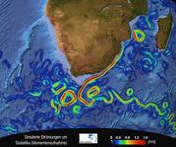 Der Agulhasstrom (rotes Band) fliesst entlang der südafrikanischen Küste. Südwestlich von Kapstadt vollzieht er eine abrupte Kehrtwende zurück in den Indischen Ozean. Dabei schnürt er Wirbel ab, die nach Westen in den Atlantik driften. (Die Farben geben die Stärke der Strömung an.)